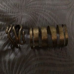 Pair of metal wrist/arm cuffs